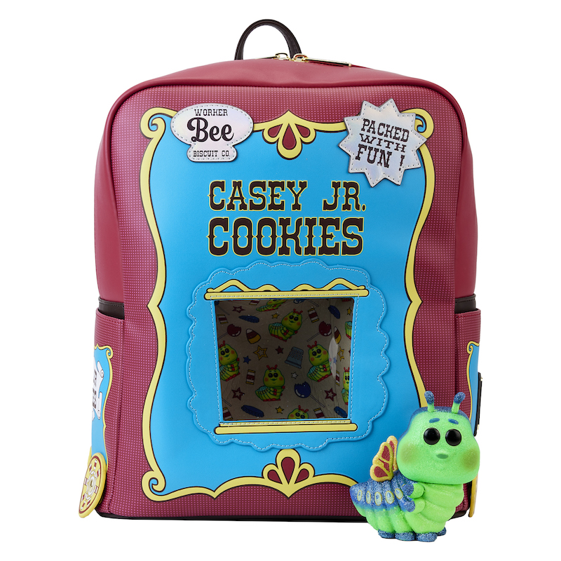 Image of a mini backpack in the shape of the Casey Jr. Cookies package from A Bug's Life. The sparkling diamond Funko Pop! of Heimlich sits beside it 